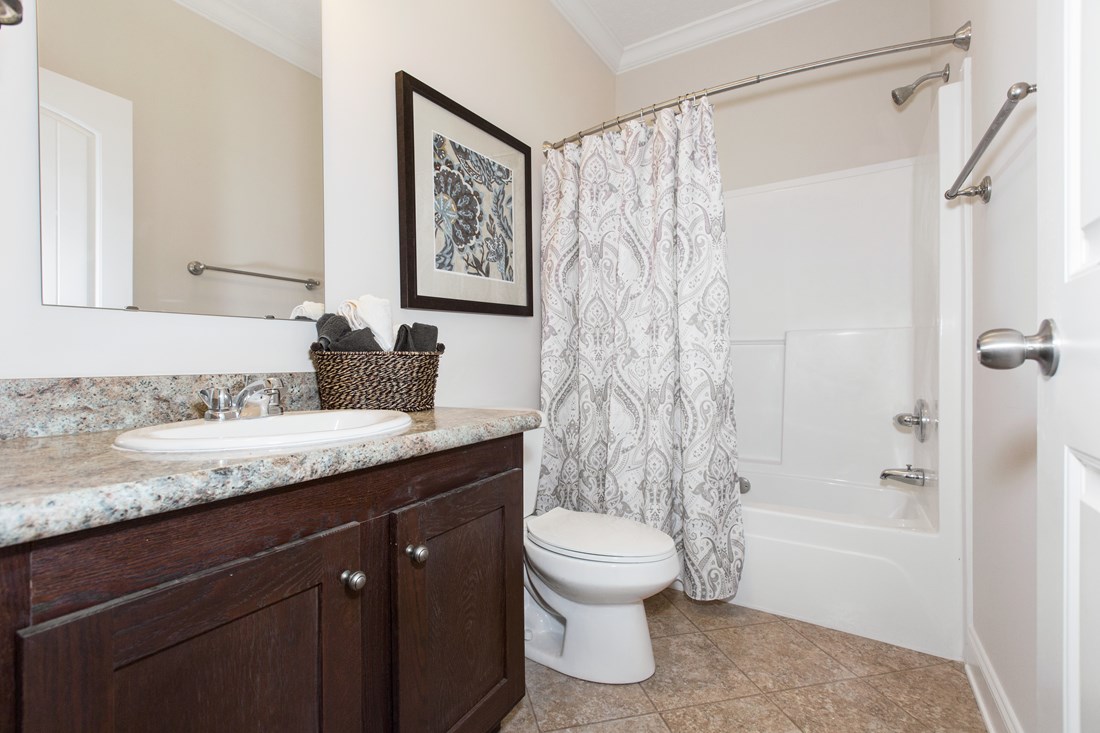 The J533 MOD Guest Bathroom. This Manufactured Mobile Home features 3 bedrooms and 2 baths.