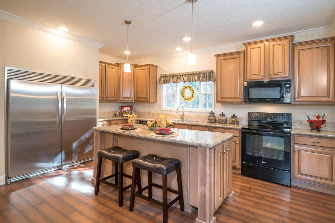 The 1545 JAMESTOWN Kitchen. This Manufactured Home features 3 bedrooms and 2 baths.