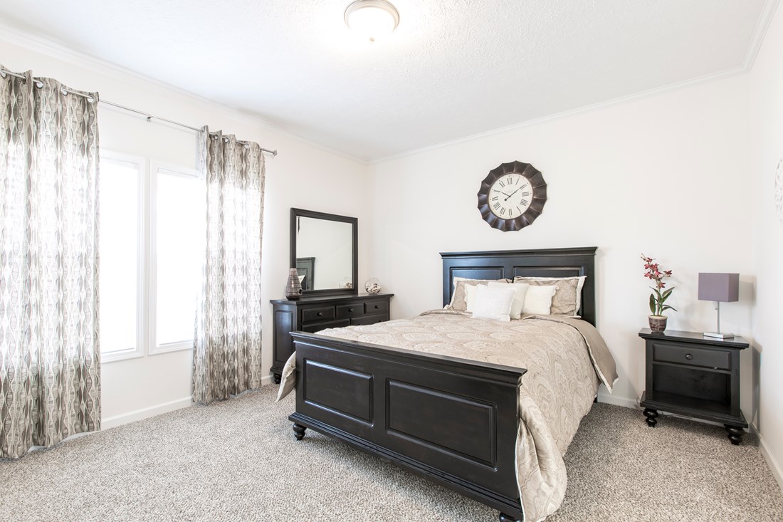 The 3558 JAMESTOWN Primary Bedroom. This Manufactured Mobile Home features 3 bedrooms and 2 baths.