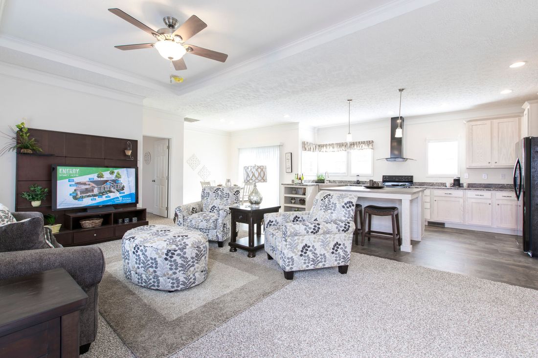 The 1558 JAMESTOWN Living Room. This Manufactured Mobile Home features 3 bedrooms and 2 baths.